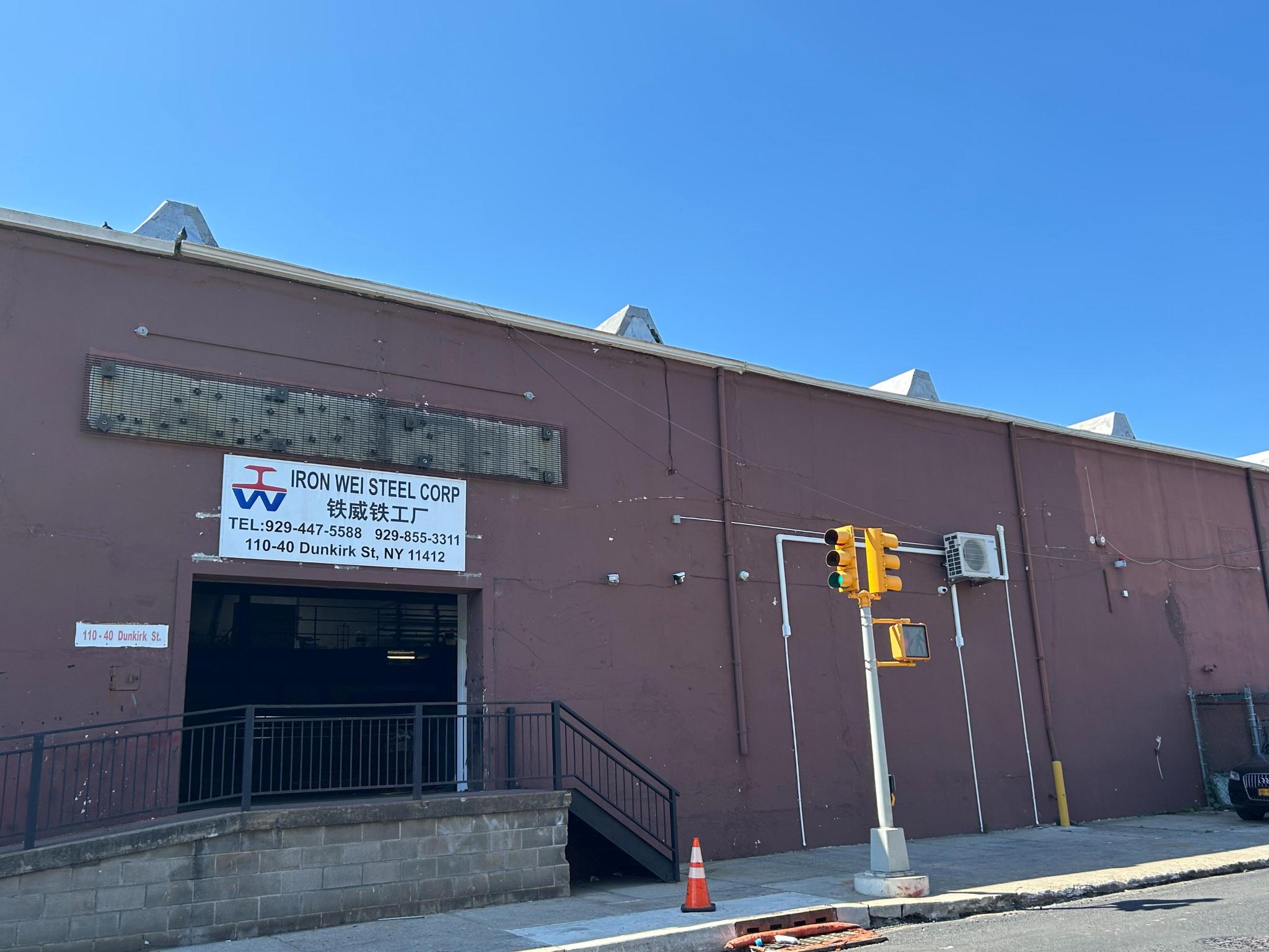 Custom metal fabrication shop at Iron Wei Steel Corp — canopy frames gates and specialty metalwork Queens NY